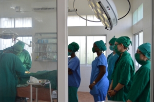 Volunteers observe a surgery at a government hospital in Tanzania